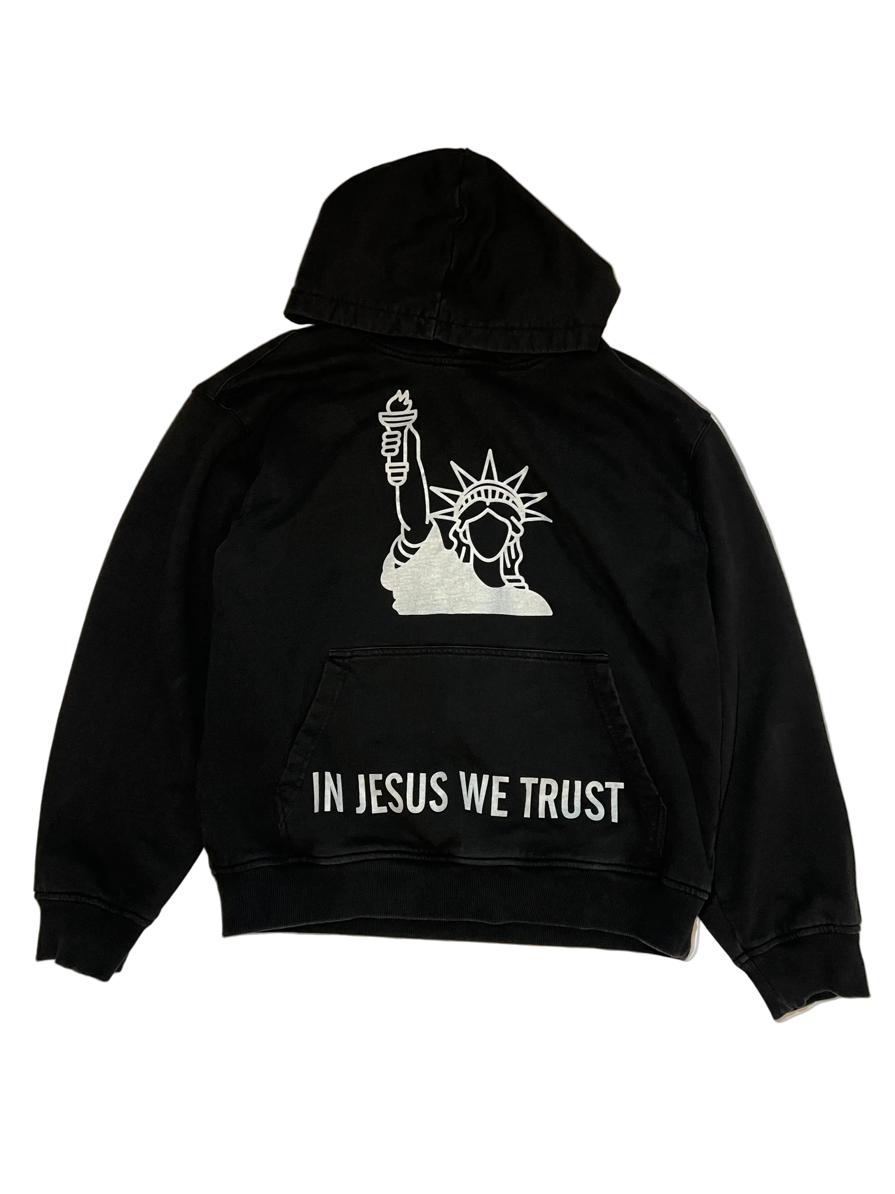 Black hoodie with a white graphic and 'In Jesus We Trust' text on the back, on a white background.